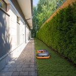 segway navimow h210 mowing a narrow section of grass